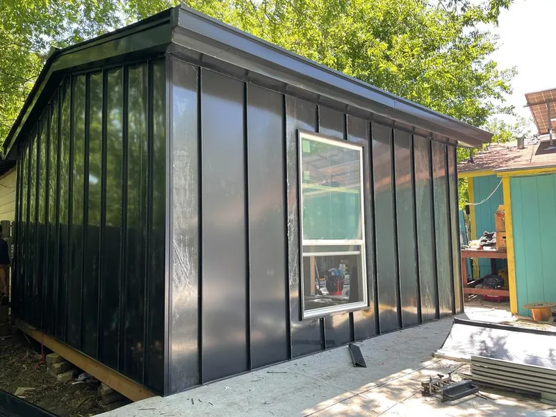 Black standing seam metal wall panels for Roof Inspection in Meadow Woods